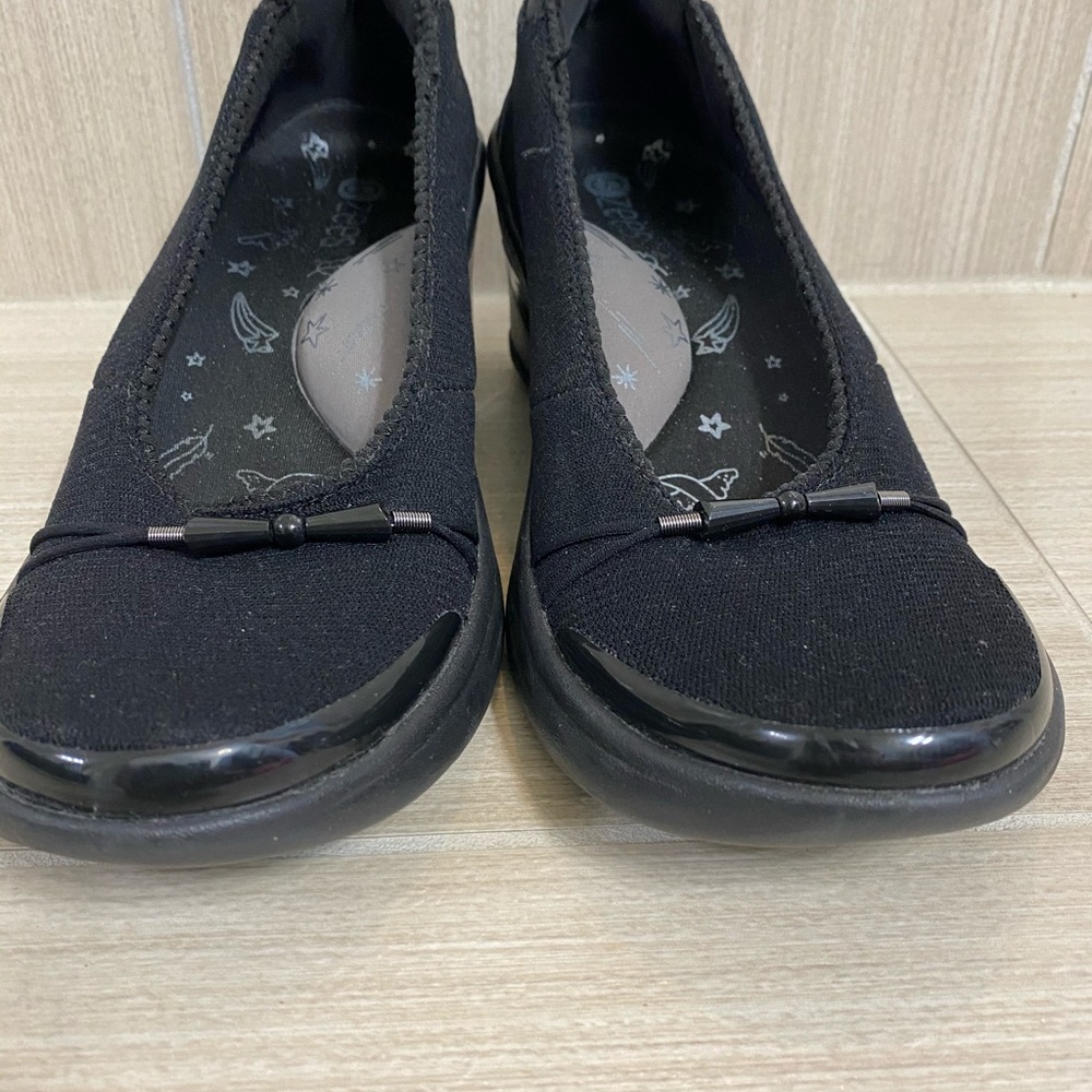Black fabric BZees with wedge heel.
